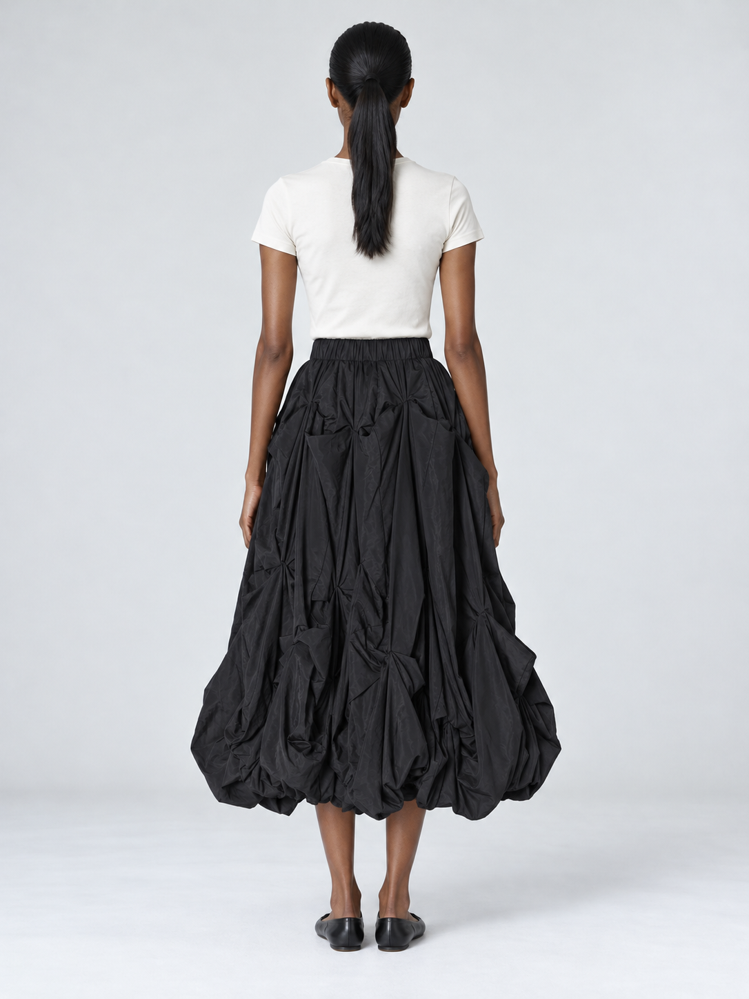 Sculpted Tuck Balloon Skirt · model-back