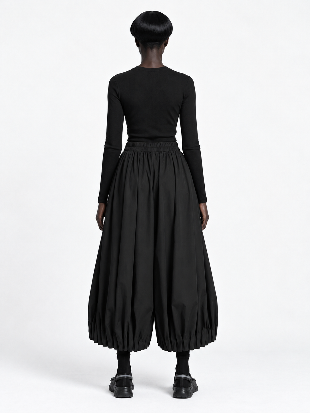 Pleated Balloon Trousers · model-back